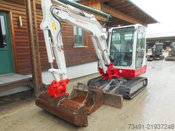 Takeuchi TB 235 mit POWERTILT