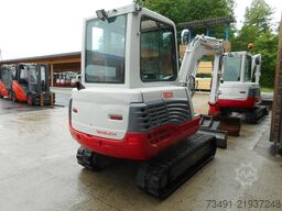 Takeuchi TB 235 mit POWERTILT