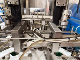 Wick und Schaefer GmbH Rotary Filler with Cap Sorter and Capper