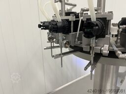 H. Jouhsen Bag filling and sealing machine