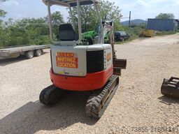 Takeuchi TB23R with 3 excavator buckets