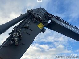 Volvo EC300EL crawler excavator w/ rototilt, cleaning an