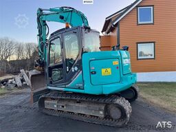 Kobelco SK75SR-3E crawler excavator with rototilt, 4 bucke