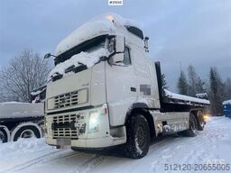 Volvo FH12 snow-plow equipped hook truck with Danish cab