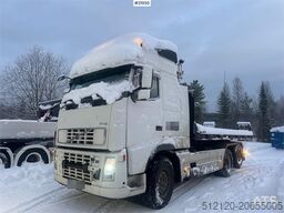 Volvo FH12 snow-plow equipped hook truck with Danish cab