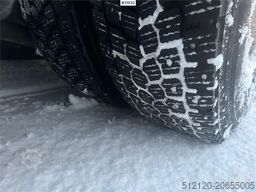 Volvo FH12 snow-plow equipped hook truck with Danish cab