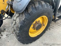 CATERPILLAR TH 406 / 4x4x4 / Greiferschaufel