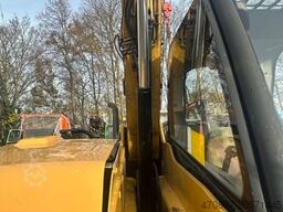 CATERPILLAR TH 406 / 4x4x4 / Greiferschaufel