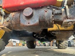 CATERPILLAR TH 406 / 4x4x4 / Greiferschaufel