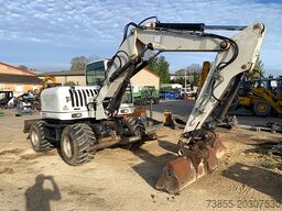 Terex TW110 with two-piece offset boom and 3 buckets