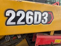 CATERPILLAR 226D3 Lader mit Schwergutschaufel