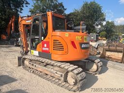 Doosan DX140LCR-5 with PowerTilt OQ65 quickcoupler (without bucket)