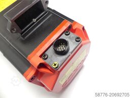 Fanuc A06B-0216-B200 # 0100 Motor SNC05XF2945 + A860-2000-T321 --