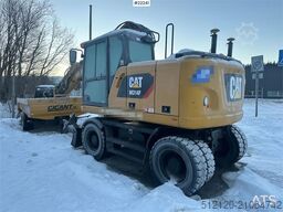 CAT M314F wheeled excavator w/ two buckets, Gigant tra