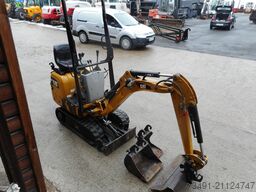 Caterpillar 300.9D mit SW + 3 Löffel