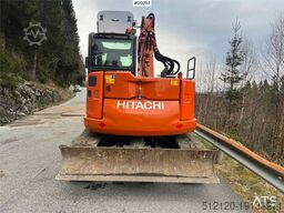 Hitachi zx85us-6 excavator w/ rototilt, sanding bucket, di