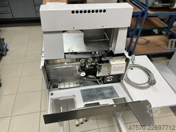Com J240/30 Banding Machine on a Base