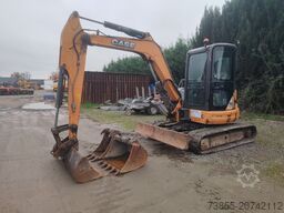 Case CX 50 with 3 excavator buckets