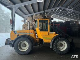 Lundberg 6200LSE wheel loader with snow blower, bucket and