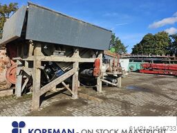 Kleemann hopper with vibrating chute