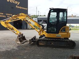 Komatsu PC55MR-5E0 with 3 buckets