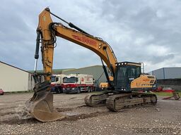 Hyundai HX300 NL with a bucket and ripper