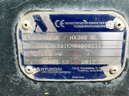 Hyundai HX300 NL with a bucket and ripper