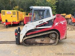 Takeuchi TL130 with forks and loader bucket