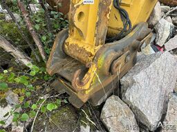 Caterpillar 323E excavator w/ 3 buckets.