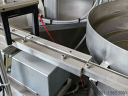 Sortier-, Zuführ- und Aufsetzmaschine