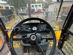 NEW HOLLAND B 115 c