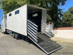 Scania R310 mit Spier Hänger 15 Pferde