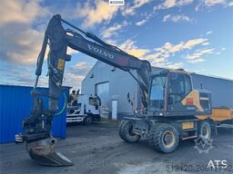 Volvo EW160E wheeled excavator with rototilt and two buc