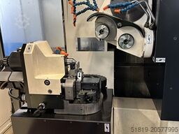 ROLLOMATIC CNC 600 X
