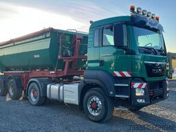 MAN TGS 18.500 4x4H BLS with 2010 Kempf SKM 31/2 SR tipper semi-trailer