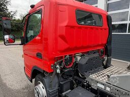 Mitsubishi Fuso Canter Transporter für Teupen LEO 30T Raupena