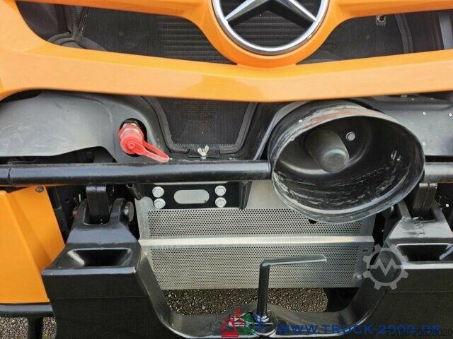 Вантажівка спеціального призначення Unimog U423 Front Zapfwelle+Arbeitsplatte+ Winterdienst