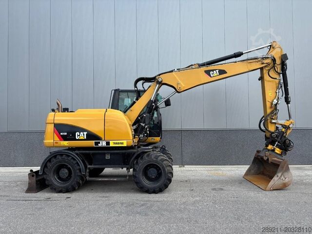 รถขุดล้อยาง CAT M 313 D