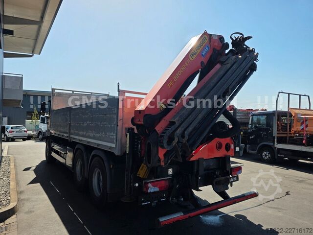 Flatbed truck MAN TGS 33.440 / 6X4 / Man+Ret / 19m Kran Palfinger