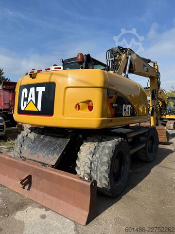 Hjulgraver CATERPILLAR M313 D