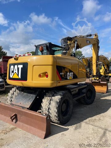 Hjulgraver CATERPILLAR M313 D