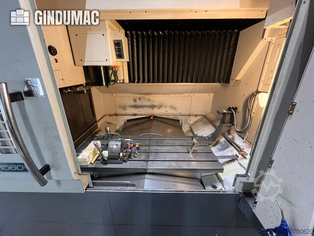 PUSAT TATANAN MENEGAK Okuma Genos 560-V