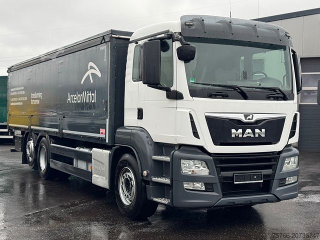 Truk bak datar dengan terpal MAN TGS 26.460 L / LENKACHSE / STAHLPRITSCHE