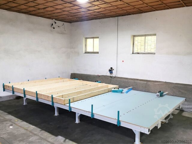Assembly table for prefabricated house 