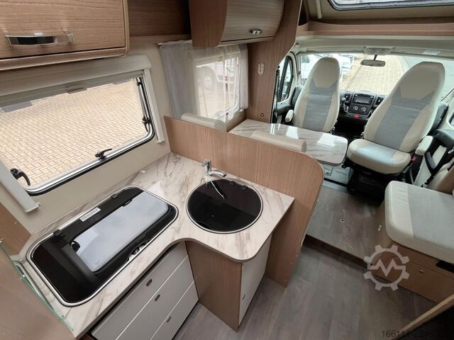 Camper semintegrato CARADO T 334 - Hub/Einzelbetten -  - Klima