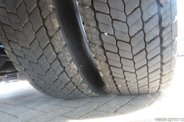 Roll-off tipper truck MAN TGS 26.440 6x2-4 BL CH