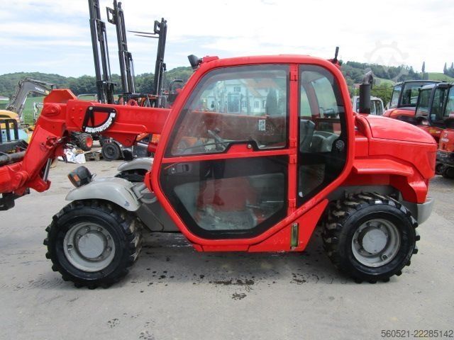 कठोर टेलीहैंडलर Manitou MT 620 mit Palettengabel (6m - 2 Ton.)