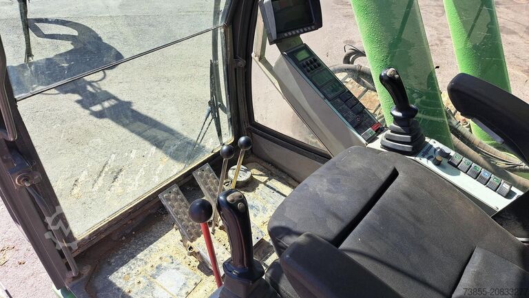 Máy xử lý vật liệu Sennebogen 850R with hydraulic rotating grapple