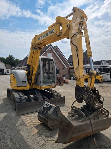 Mini bager NEW HOLLAND E70SR-1ES