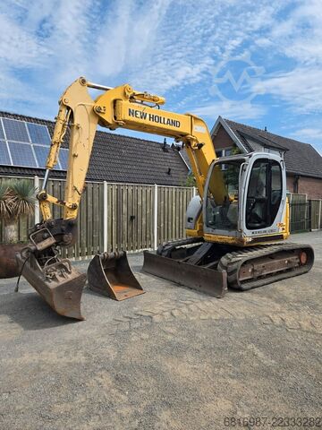 Mini bager NEW HOLLAND E70SR-1ES